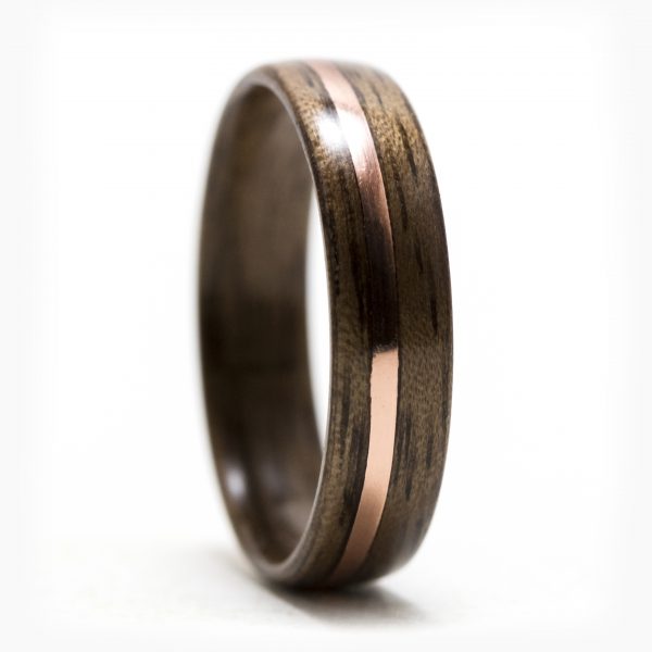Walnut wood ring with copper inlay