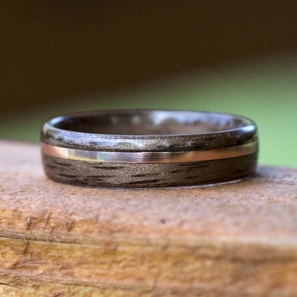 Walnut wood ring with copper inlay