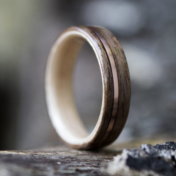 Walnut wood ring lined with maple and copper inlay