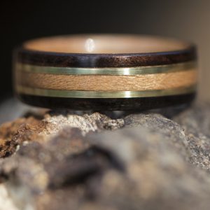 Ebony bentwood ring lined with cherry and inlaid with yellow brass and cherry