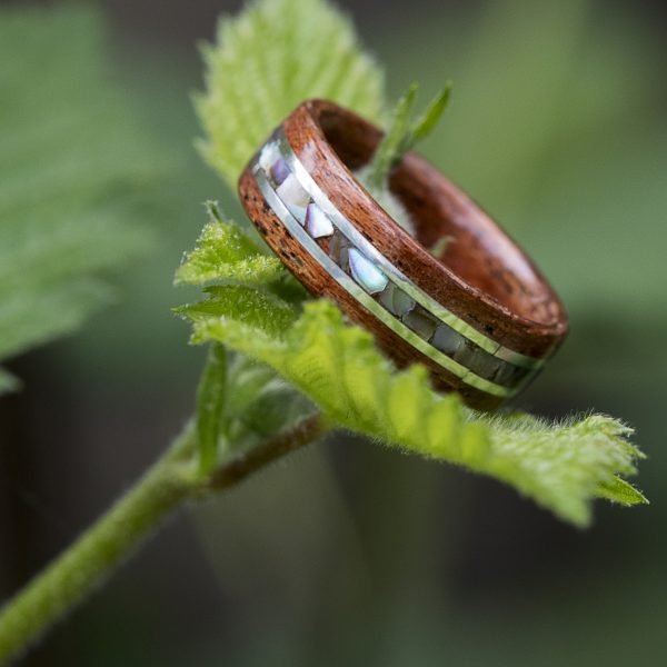 mahogany wood ring inlaid with silver and abalone shell