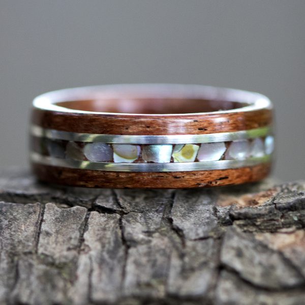 mahogany wood ring inlaid with silver and abalone shell
