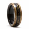 Cherry wood ring inner lined with ebony and inlaid with tiger eye, obsidian, and ebony wood