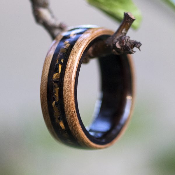 Cherry wooden ring lined ebony and tiger eye, obsidian, and ebony wood inlay