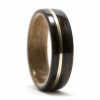 Ebony wood ring inner lined with cherry and inlaid with a guitar string