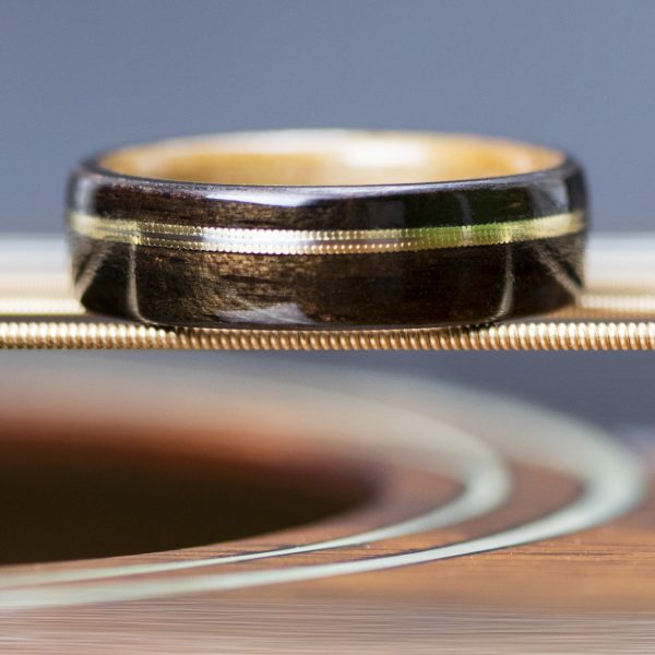 Ebony wooden ring lined with cherry and guitar string inlay
