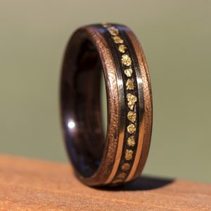 Walnut wooden ring lined ebony inlaid with gold nuggets and gold filled wire
