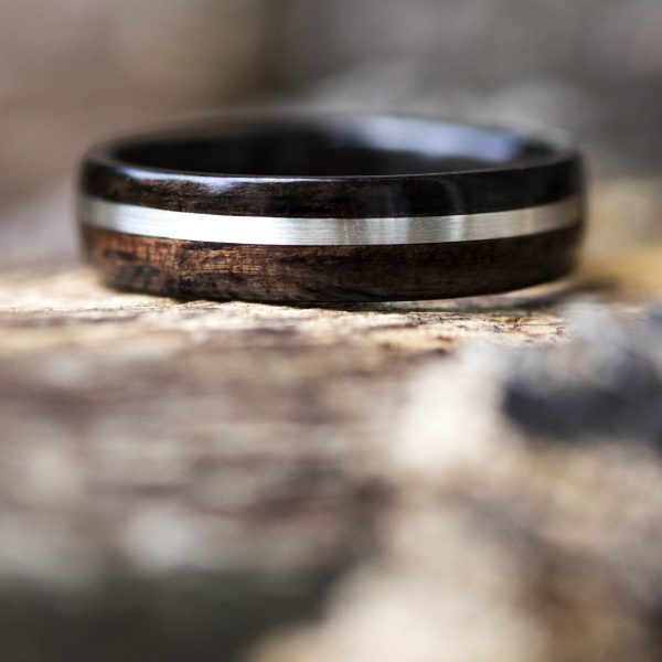 Ebony wood ring inlaid with silver