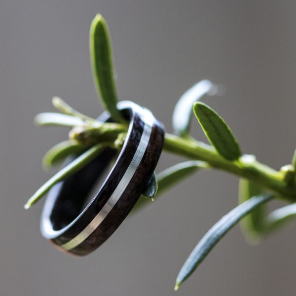 Ebony wood ring inlaid with silver
