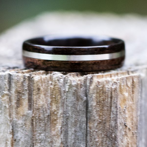 Ebony wooden ring with silver inlay