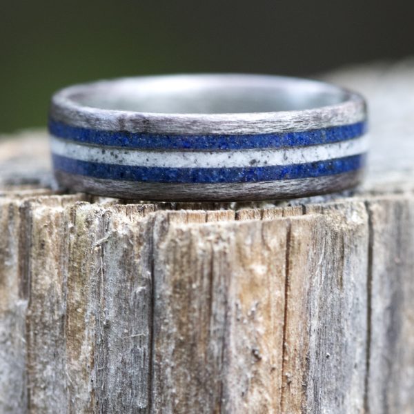 Gray birdseye maple wood ring with lapis lazuli and howlite inlay