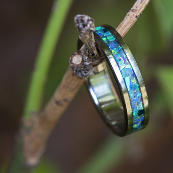 Titanium ring with opal inlay
