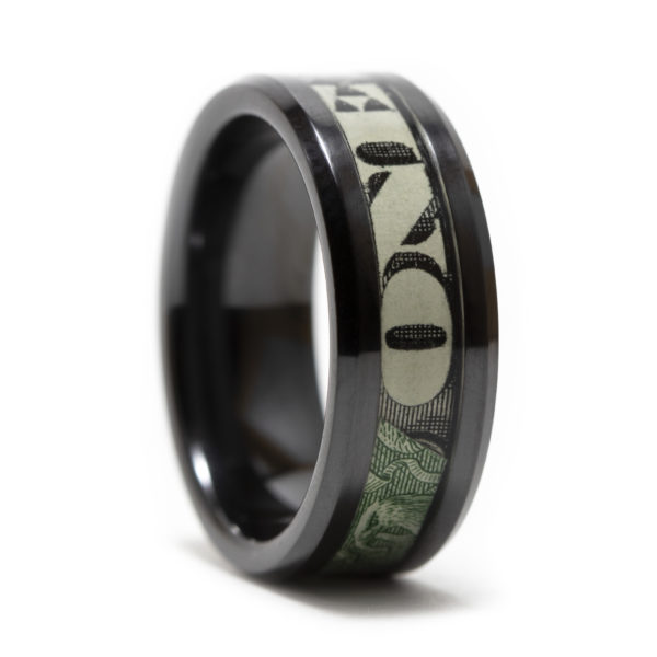 Black ceramic ring inlaid with a dollar bill